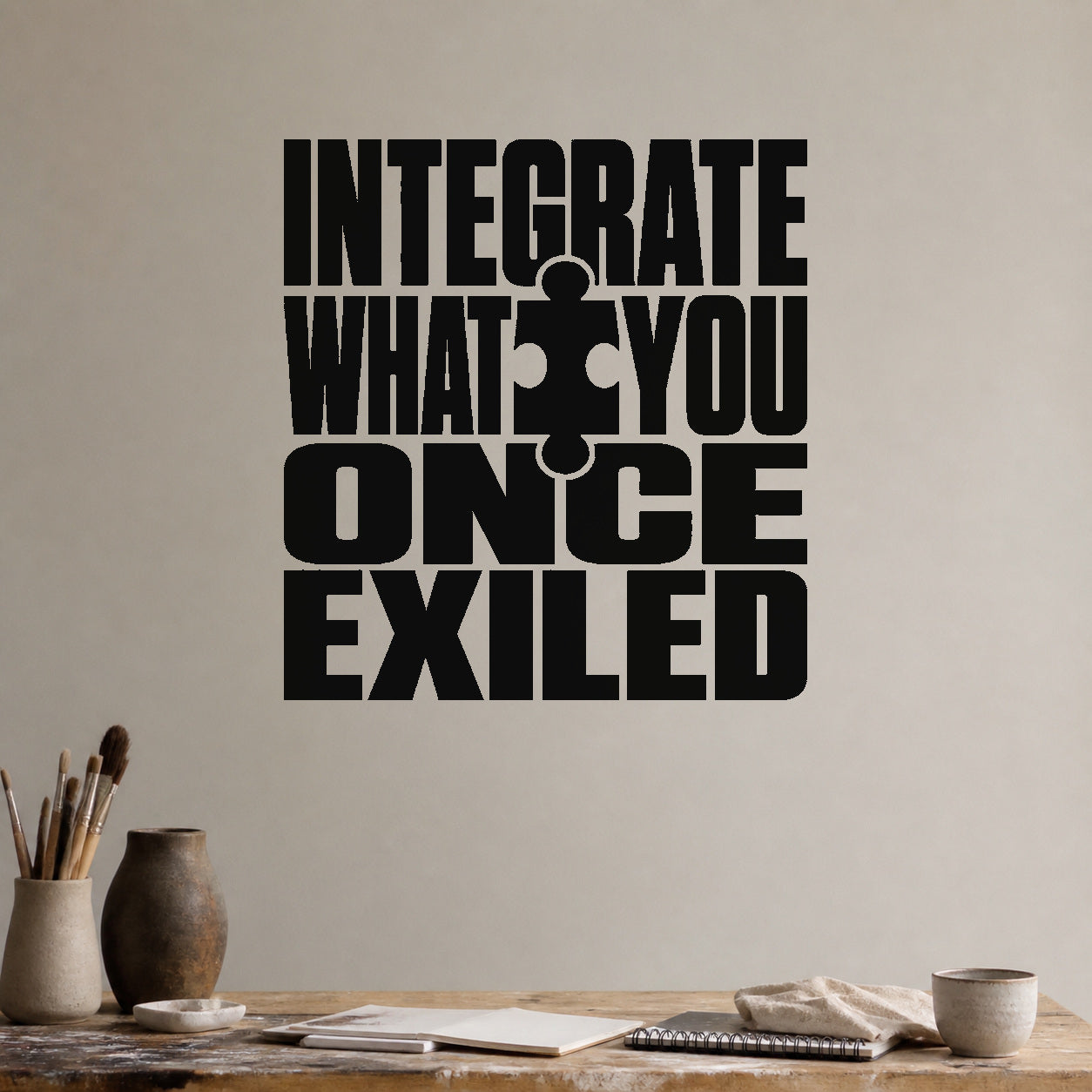 Integrate What You Once Exiled removable vinyl wall decal shown in a styled room.