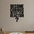 Become Curious About the Reaction removable vinyl wall decal shown in a styled room.