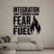 Integration Turns Fear Into Fuel removable vinyl wall decal shown in a styled room.