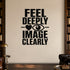 Feel Deeply Image Clearly removable vinyl wall decal shown in a styled room.