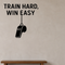 Train Hard, Win Easy - Sports Motivation Wall Decal Vinyl Sticker Removable shown as a removable vinyl wall decal in a category-appropriate room