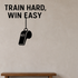 Train Hard, Win Easy - Sports Motivation Wall Decal Vinyl Sticker Removable shown as a removable vinyl wall decal in a category-appropriate room