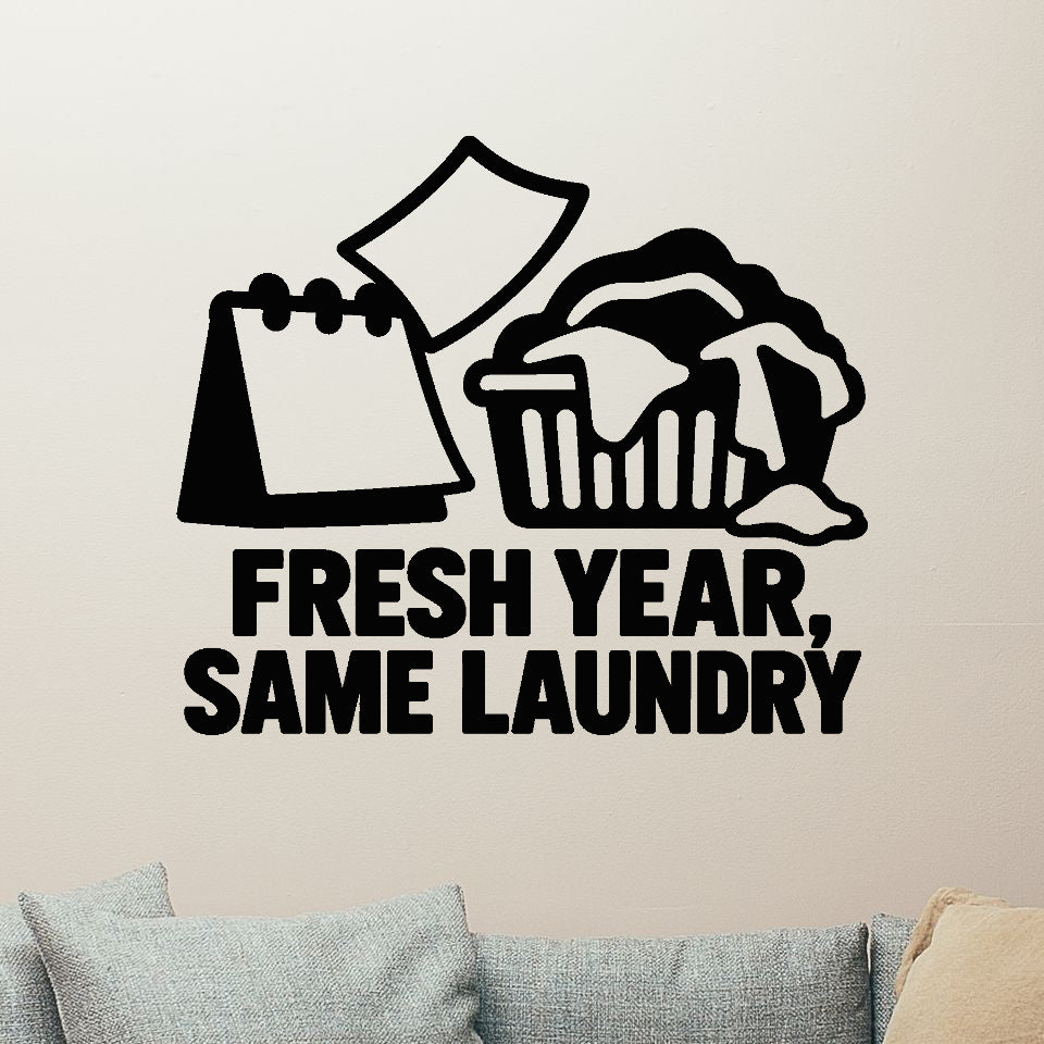 Fresh Year, Same Laundry Removable Wall Decal shown on a clear indoor wall