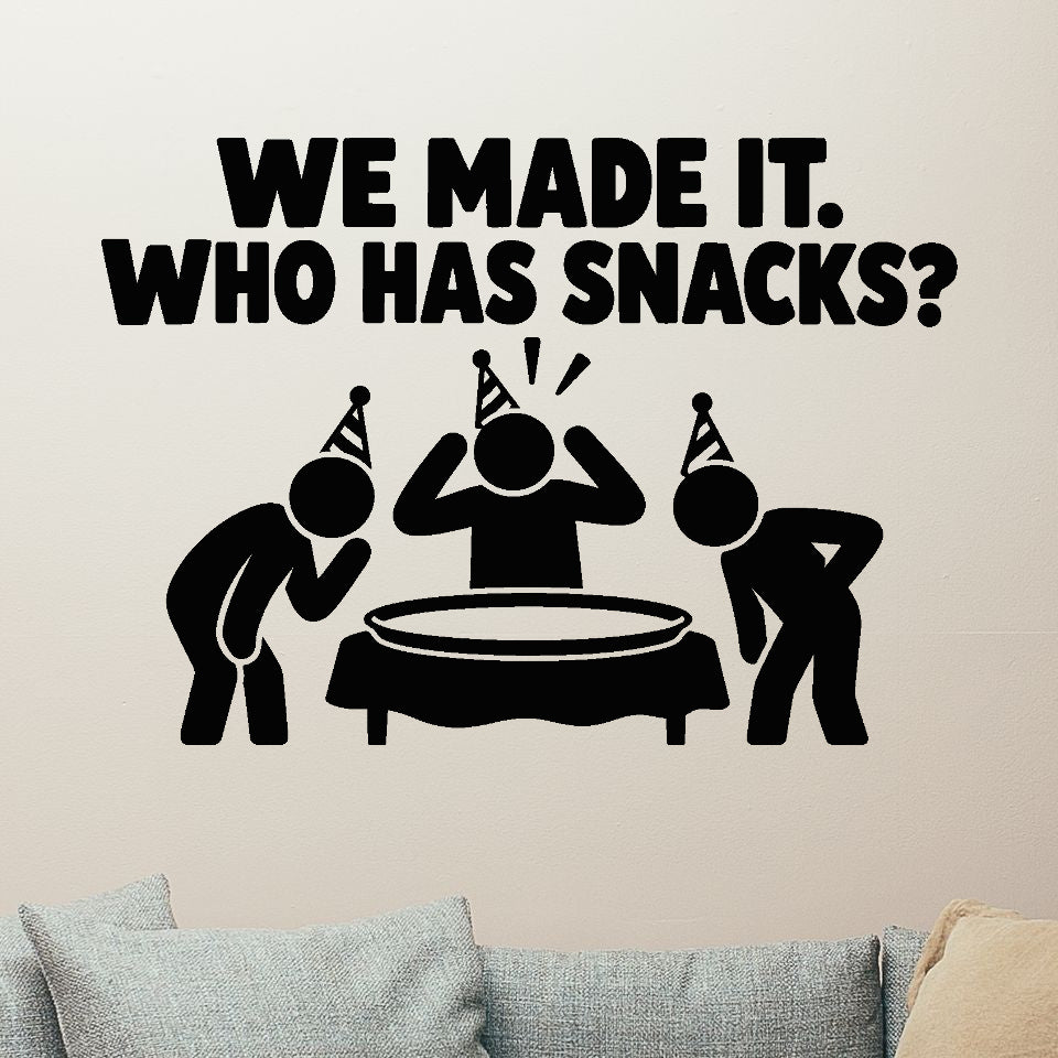 We Made It. Who Has Snacks Removable Wall Decal shown on a clear indoor wall