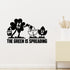 The Green Is Spreading Removable Wall Decal shown on a clear indoor wall