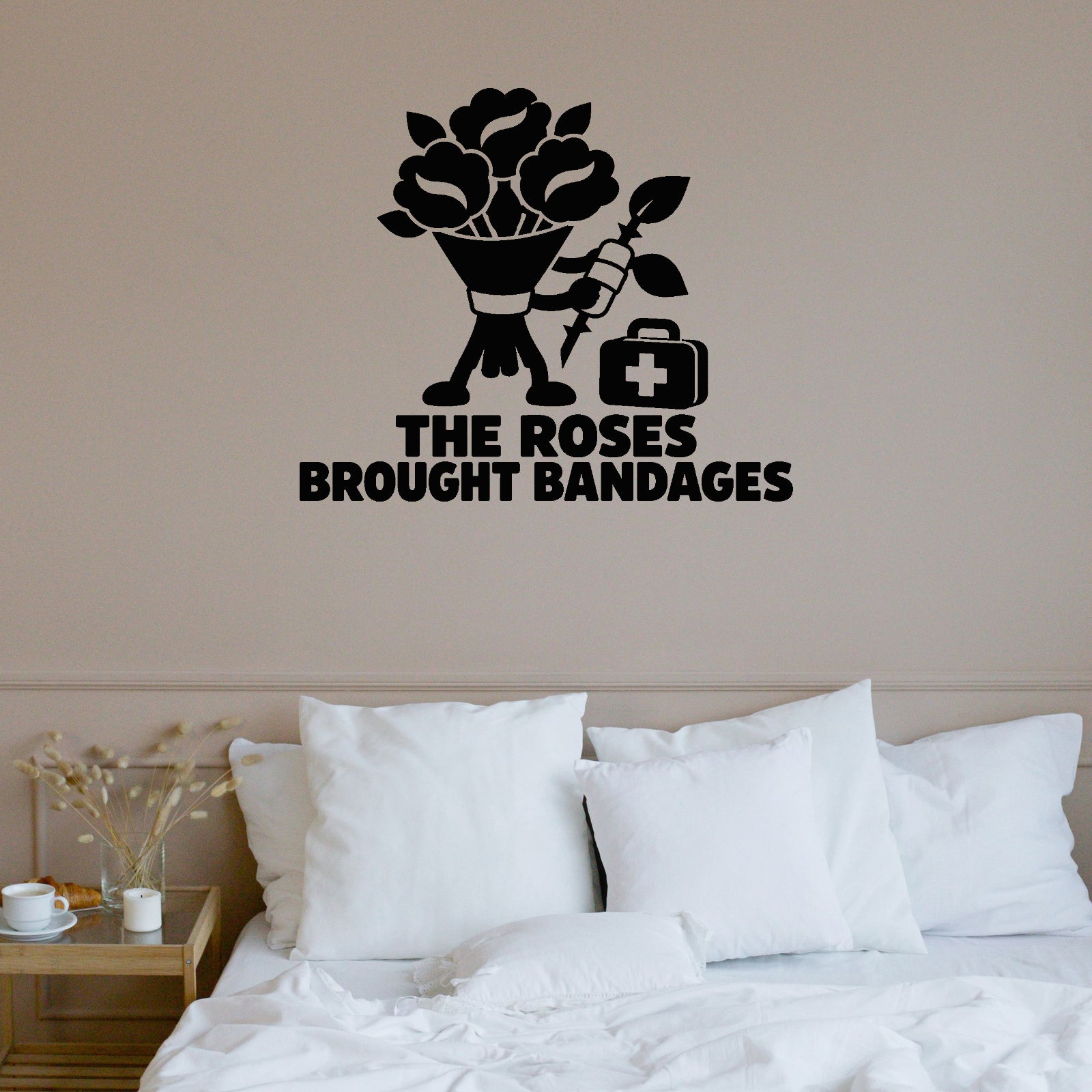 The Roses Brought Bandages Removable Wall Decal shown on a clear indoor wall