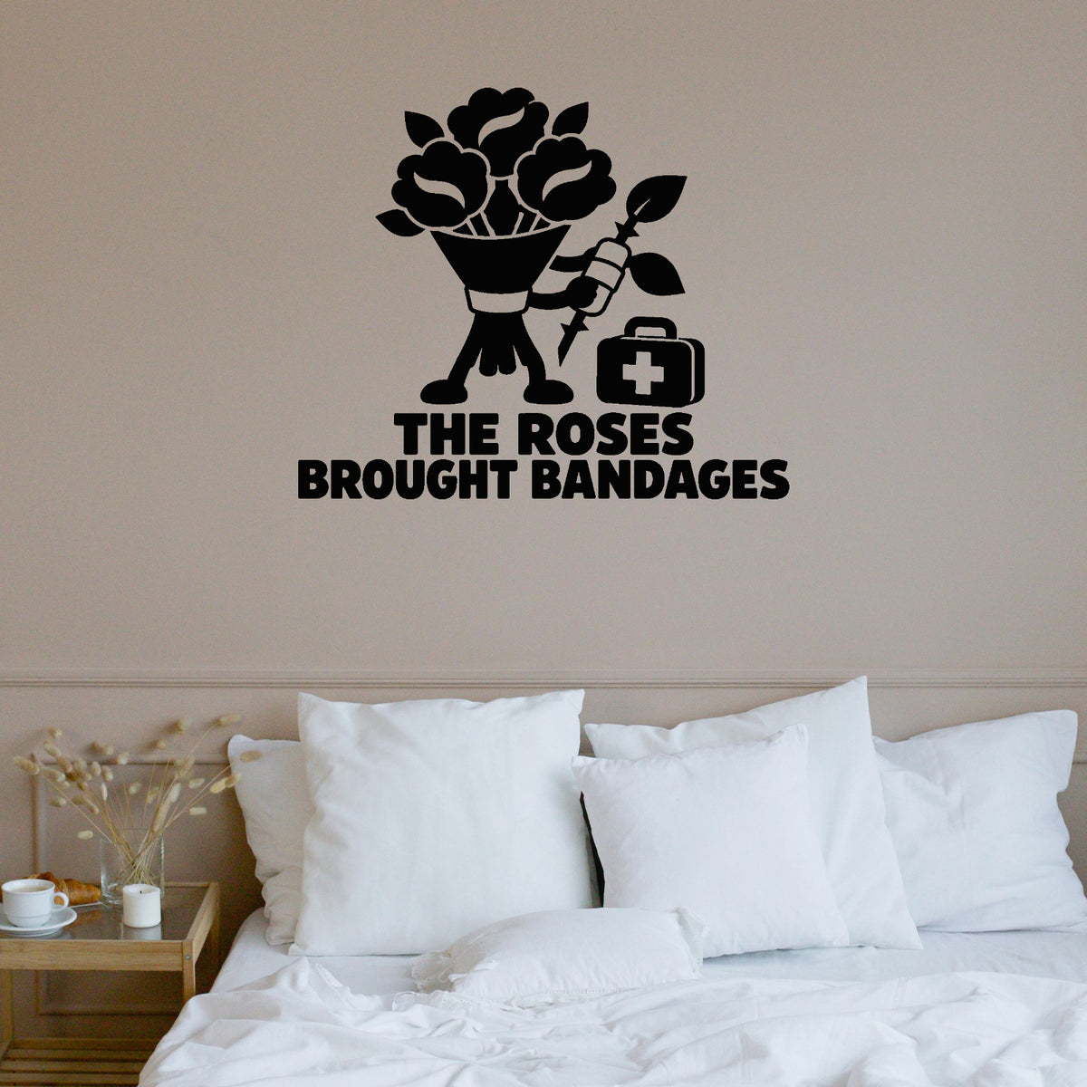 The Roses Brought Bandages Removable Wall Decal shown on a clear indoor wall