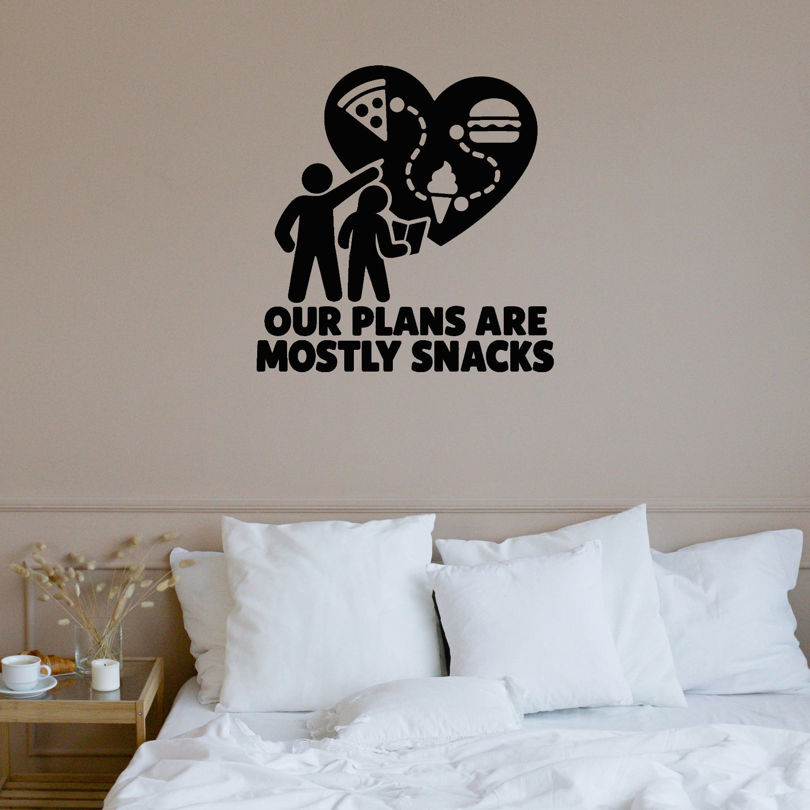 Our Plans Are Mostly Snacks Removable Wall Decal shown on a clear indoor wall