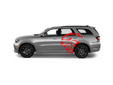 a silver car with a red dragon decal on it
