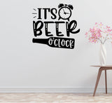 a wall decal with the text "IT'S BEER O'CLOCK" along with an illustration of a bottle and an alarm clock.