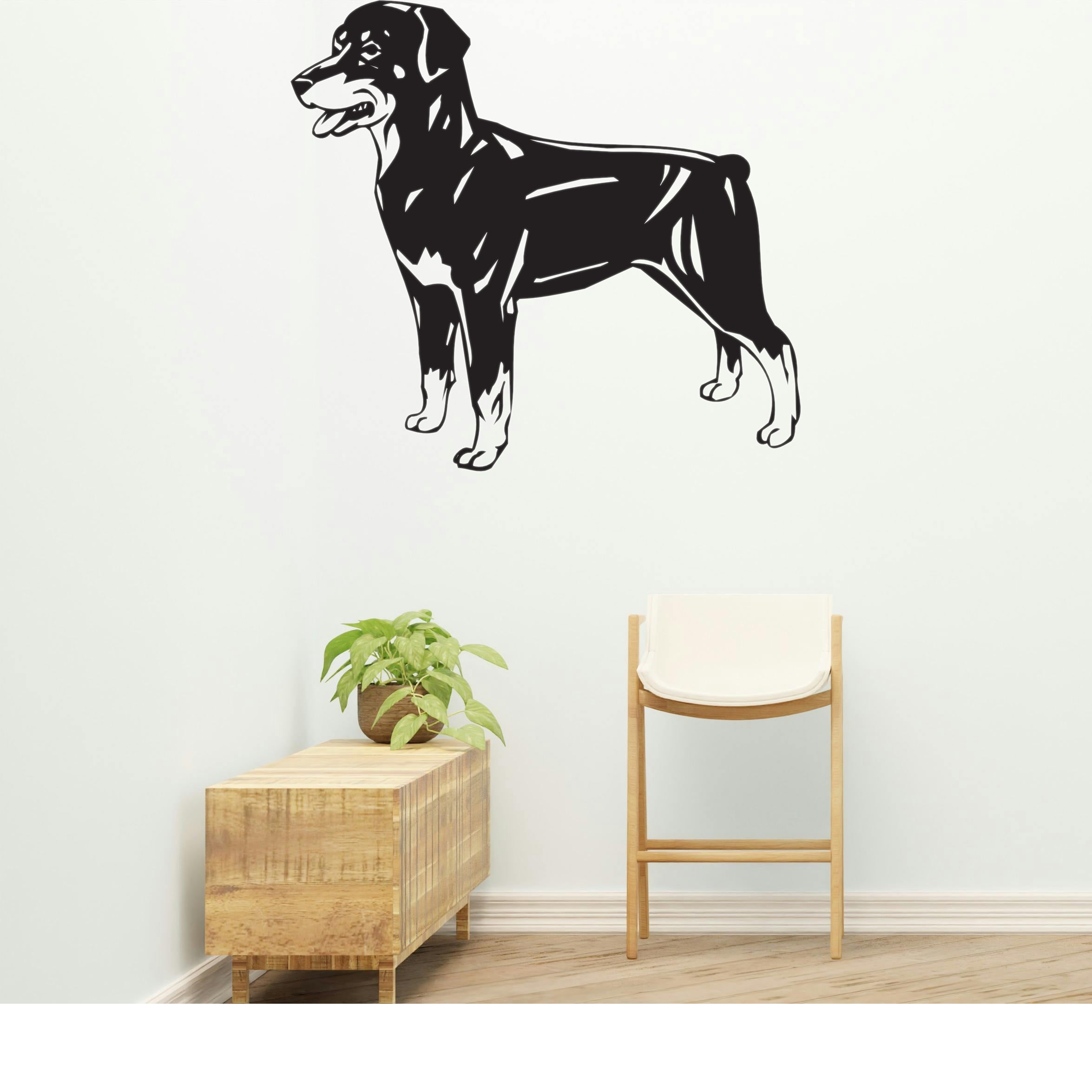 a black and white dog wall decal on a white wall