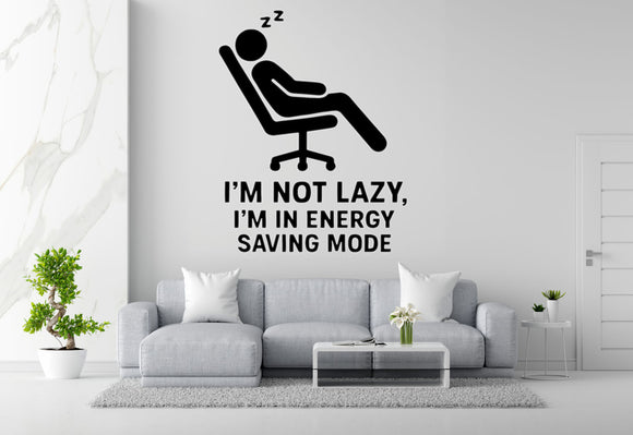 a wall decal with a person sleeping in a chair, accompanied by the text 