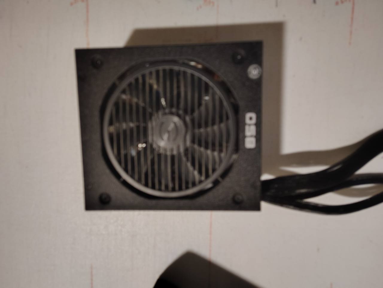 Actual EVGA power supply cooling fan and 850 marking